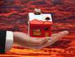 The Hand of the Businessman with the House The Hand of the Businessman with the House