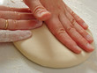 hands kneading the dough hands kneading the dough