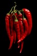 Red Cayenne Peppers on Black