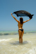 flying woman on the beach flying woman on the beach
