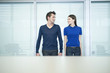 business couple romancing in an office
