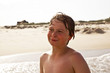 smiling happy boy at the beach