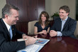 Couple talking to Financail advisor
