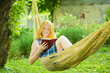 Images : girl reading book on hammock