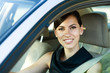 Happy woman Driving Her Car