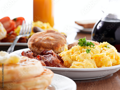 Photo: huge breakfast with selective focus on center plate huge breakfast with selective focus on center plate