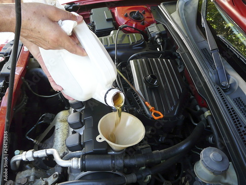Photo: Pouring Motor Oil Pouring Motor Oil