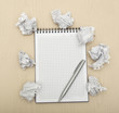 Blank notepad with ink pen on wooden desk. Blank notepad with ink pen on wooden desk.
