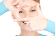 lovely woman creating a frame with fingers