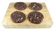 four cookies on cooling board isolated on white