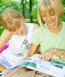 Two School Girls Reading the Book outdoor