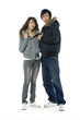 young casual couple portrait in white background
