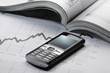 Mobile phone on business background