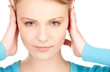 woman with hands on ears
