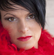 Woman wearing red fethers