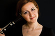 Cheerful clarinetist women