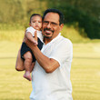 Grandpa holding baby grandson Grandpa holding baby grandson