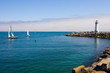 Lighthouse and sail boats Lighthouse and sail boats