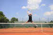 TENNISMATCH - winner jumping in the air