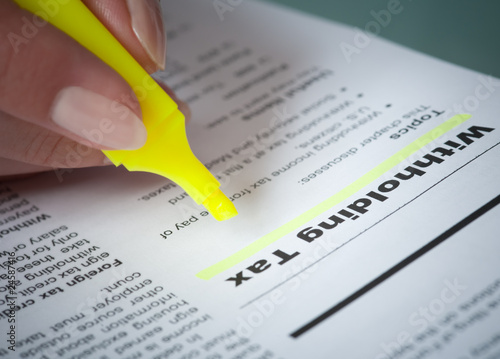 Photo: Withholding Tax. IRS Instruction Withholding Tax. IRS Instruction