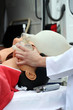 The man on a dummy trains to do Cardiopulmonary resuscitation