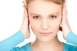 woman with hands on ears