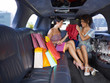 women shopping in limousine