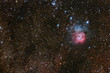 Trifid Nebulae complex among Milky Way stars in Sagittarius. Trifid Nebulae complex among Milky Way stars in Sagittarius.