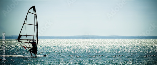 Photo: windsurfer panorama against a crystal sea windsurfer panorama against a crystal sea