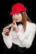Portrait of a pretty young woman with red bonnet