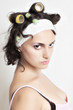 Photo: Portrait of housewife with curlers in her hair Portrait of housewife with curlers in her hair