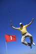 Foto: GOLF - lucky golfer is jumping in the air GOLF - lucky golfer is jumping in the air