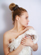 Foto: Beautiful woman in white fur Beautiful woman in white fur