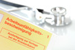 Arbeitsunfähigkeitsbescheinigung mit Stethoskop