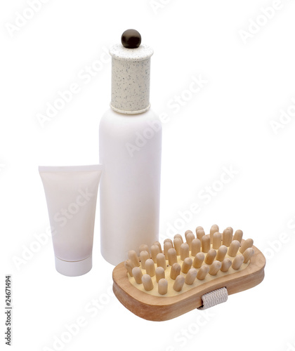 Photo: cosmetic set with wooden massager isolated cosmetic set with wooden massager isolated