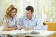 Couple planning at home Couple planning at home