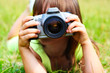 Photo: The child holds the photocamera The child holds the photocamera