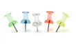 Row of multicolor push pins