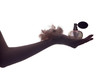 hand of a woman holding a bottle of vintage perfume hand of a woman holding a bottle of vintage perfume