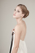Photo: Young Woman Holding the Front of Her Dress Young Woman Holding the Front of Her Dress