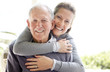 Beautiful young woman embracing his father