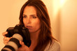 Portrait of smart female photographer shooting Portrait of smart female photographer shooting