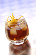 Appetizer Bunueloni with ice cubes and slices of orange skin Appetizer Bunueloni with ice cubes and slices of orange skin