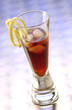 Appetizer Bitter Negroni with ice cubes and slices of lemon Appetizer Bitter Negroni with ice cubes and slices of lemon