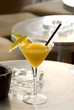 Mango Daiquiri with two slices of mango in martini-glass Mango Daiquiri with two slices of mango in martini-glass