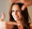 Young woman creating a frame with her hands