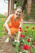 woman doing work with tulips
