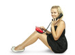 young woman sitting and talking on phone