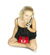 young  girl talking on old phone