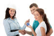 Real estate agent and young couple Real estate agent and young couple